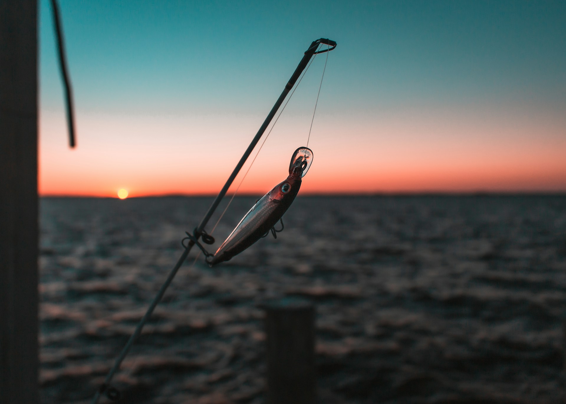 Fishing hook by the sunset